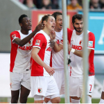 Baba Rahman celebrates Augsburg's first Bundesliga win in five matches